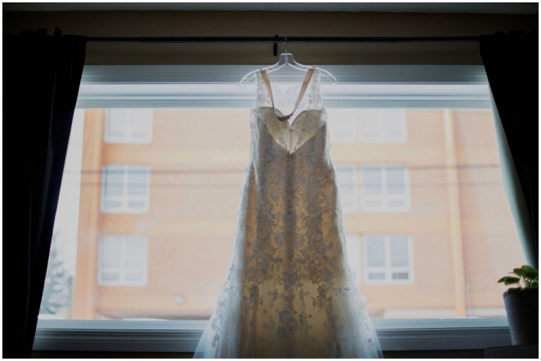 Wedding Dress Hanging in window